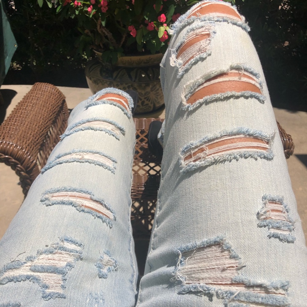Ripped light blue jeans sizes 4 & 6